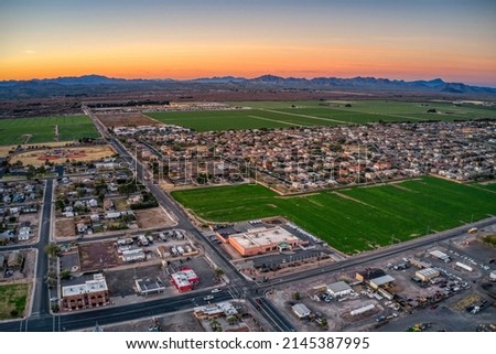 Aerial View of Sunrise over the Phoenix Suburb of Buckeye, Arizona Royalty-Free Stock Photo #2145387995