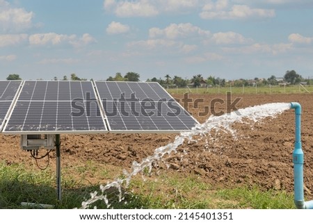 Solar panel for waterpump in agricultural field Royalty-Free Stock Photo #2145401351