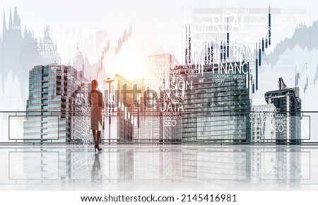Young businesswoman in suit at balcony against morning cityscape background