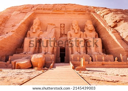Statue of Seated Ramses II at the Great Ramses II Temple in Abu Simbel Village in Aswan, Egypt. Royalty-Free Stock Photo #2145439003