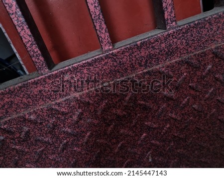 Background with the image of a door made of reddish brown iron