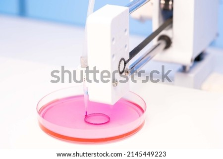 3D  bioprinting is the utilization of 3D printing  to combine cells, growth   biomaterials to make biomedical parts Royalty-Free Stock Photo #2145449223