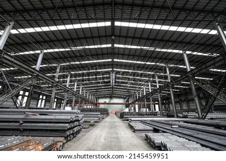Many steels are stacked together in the production workshop
