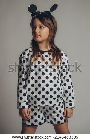 Beautiful and fashionable child girl. High quality photo
