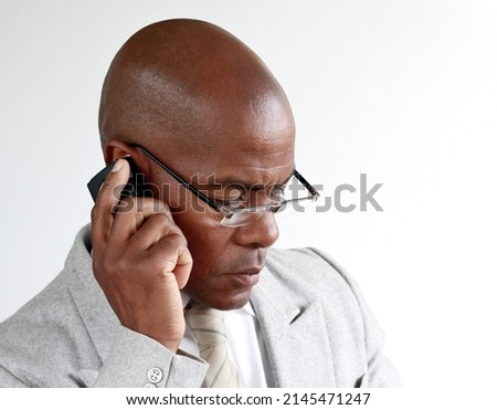 businessman making a phone call on his office mobile phone with people stock photos  