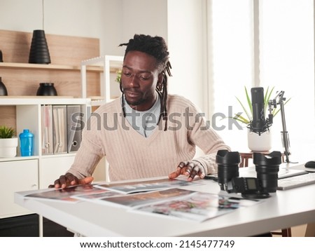 Graphic designer photographer working in home office