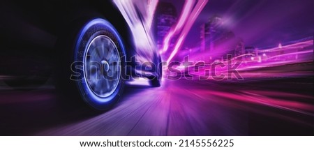Speeding car with speedometer. Low angle side view of car driving fast on motion blur Royalty-Free Stock Photo #2145556225