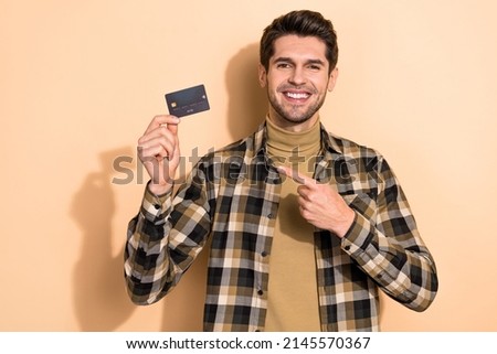 Photo of economist banker demonstrate profit debit card for buyers purchase isolated pastel color background