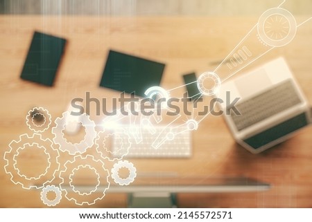 Creative abstract robotics technology sketch on modern laptop background, future technology and AI concept. Double exposure