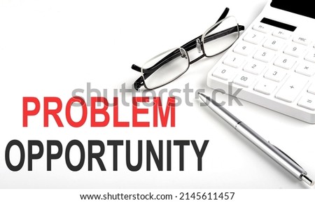 PROBLEM OPPORTUNITY Concept. Calculator,pen and glasses on white background
