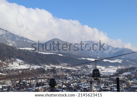 cable car with City of Schladming in background