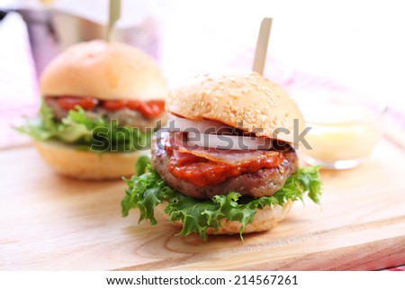 two homemade hamburger with fresh vegetables