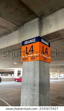 Location sign for parking garage in Disney