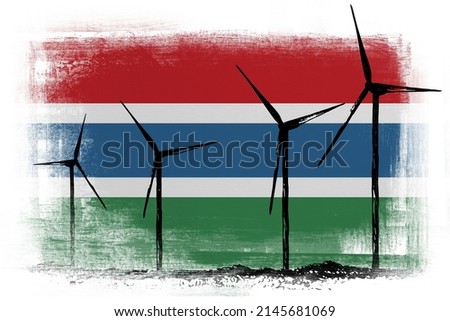 Wind energy generators on background in colors of national flag. Gambia
