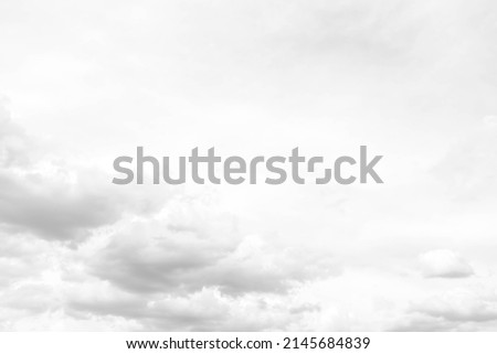White fluffy cloudscape scenery, environment background with copy space. Cumulus clouds floating in a light sky. Pure and fresh air in dull day. Freedom of nature. Royalty-Free Stock Photo #2145684839