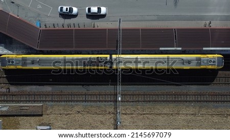 Passenger train at trainstation waiting for passengers