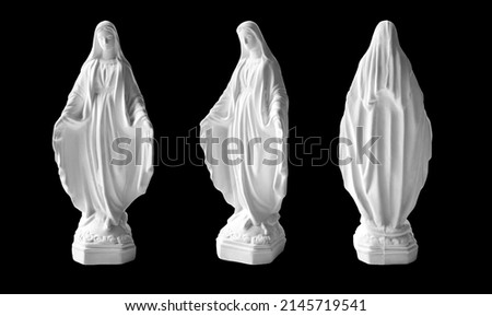 Virgin Mary, Statues of Holy Women isolated on black background, Mother of God, Sculpture of the Virgin, Beautiful statue of a religious praying woman Royalty-Free Stock Photo #2145719541