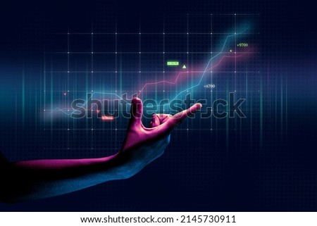 Businessman hand finance business chart of metaverse technology financial graph investment  Royalty-Free Stock Photo #2145730911