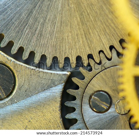 Background with metal cogwheels a clockwork. Rather unique macro photo, for your successful business design. Extreme closeup. Macro