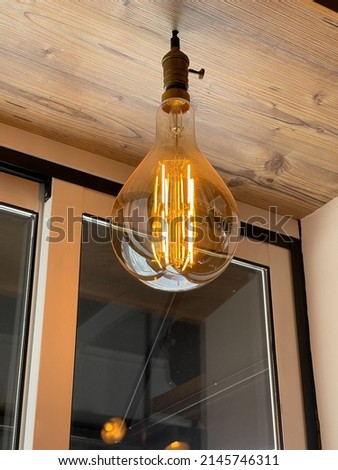 Closeup of large LED light bulb  Royalty-Free Stock Photo #2145746311