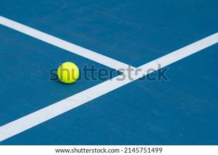 A Single Tennis Ball On a Tennis Court - Great Photo For Tennis or Sports Related Promotions Royalty-Free Stock Photo #2145751499
