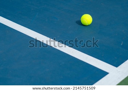 A Single Tennis Ball On a Tennis Court - Great Photo For Tennis or Sports Related Promotions Royalty-Free Stock Photo #2145751509