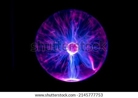 Plasma Light Ball on black background Royalty-Free Stock Photo #2145777753