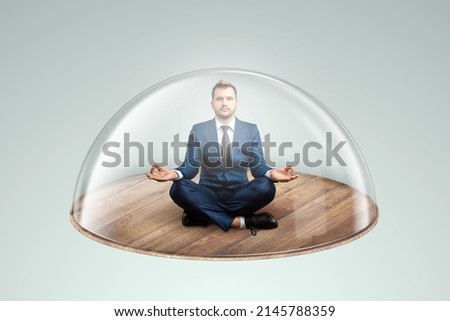 Businessman in a suit under a glass dome. The concept of insurance, risk assessment, protection, strategy, plan