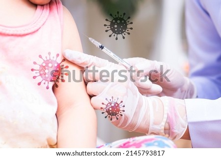 Doctor vaccinating children against coronavirus