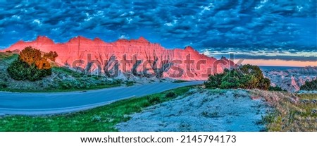 Panorama of the mountain range at sunset. Mountain road panorama in evening. Sunset mountain panoramic landscape. Mountain dusk panorama Royalty-Free Stock Photo #2145794173