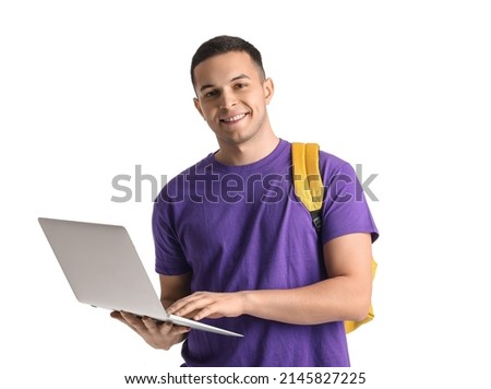 Male student using laptop on white background Royalty-Free Stock Photo #2145827225