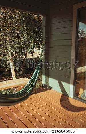 Hammock near the country house in the village. 