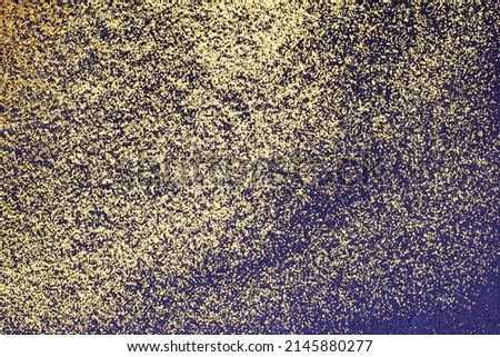 Golden glitter on a black background. Holiday concept. The best background for your presentation