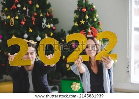 young couple are happy and fun in celebration 2021 new year party and Christmas holiday