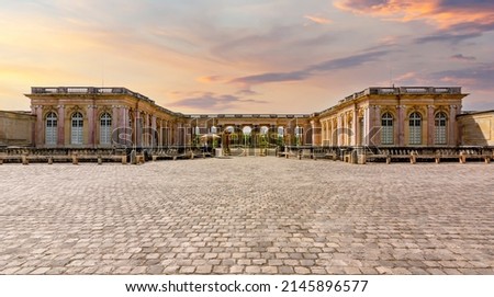Grand Trianon palace in Versailles park outside Paris at sunset, France Royalty-Free Stock Photo #2145896577