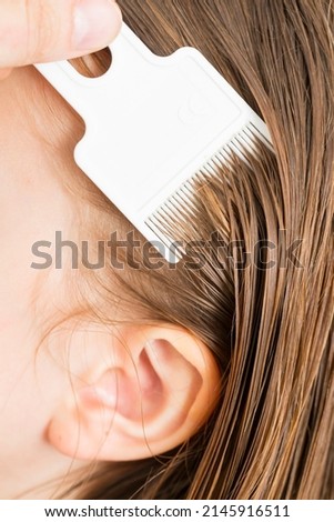 
combing hair lice - hygiene