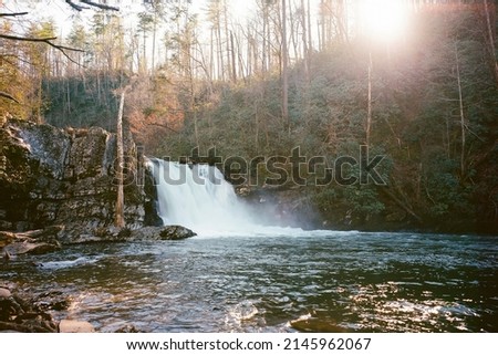 This photo was shot on a film camera in the Great Smoky Mountains National Park.  Abrams Falls is located in Cades Cove and a short but scenic two-mile hike takes you to the falls deep in the smokies.