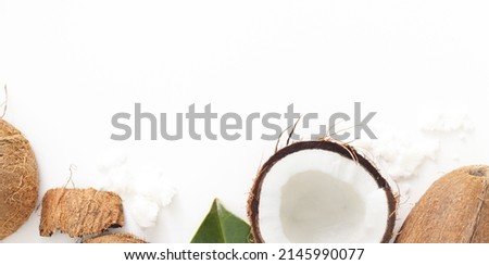Full jar with coconut scrub on white background. Home spa treatment concept, organic cosmetic. Copyspace, banner.