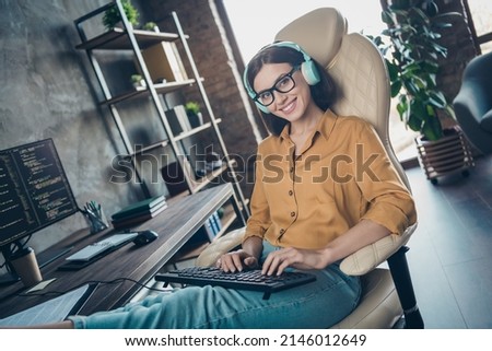 Photo of positive smart editor lady sitting chair keyboard write operating security workstation inside