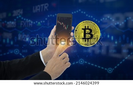 Hands of analysts, investors, business people who use analytics mobile apps for their financial stock market analysis. cryptocurrency