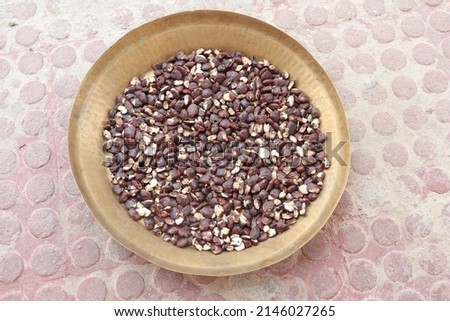 Tamarind seeds isolated on floor background