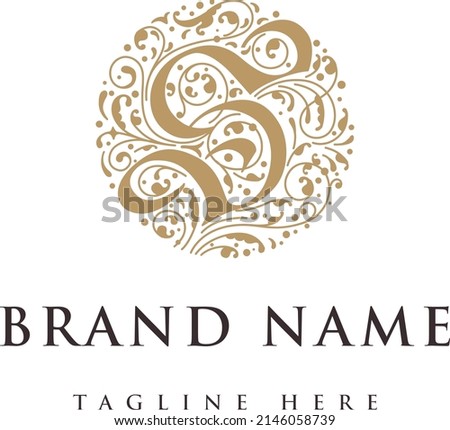 Calligraphy inspired flourished logo design with the capital letter S. 