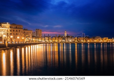 Panoramic view of Bari, Southern Italy, the region of Puglia(Apulia) seafront at dusk. Basilica San Nicola in the background.  Royalty-Free Stock Photo #2146076569