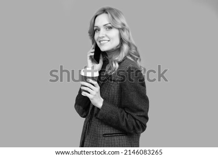 Enhanced coffee for enhanced lifestyle. Woman hold disposable cup talking on phone. Modern lifestyle