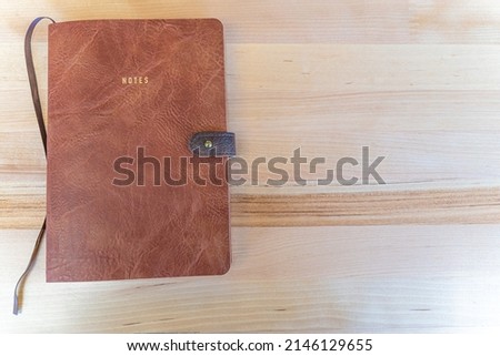 Leather covered notebook journal for taking notes and drawing
