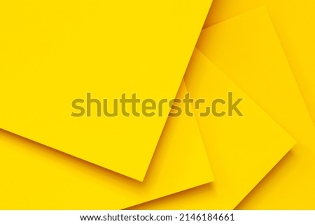 Abstract monochrome creative paper texture background. Minimal geometric yellow color shapes and lines. Top view