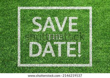 The turf that says SAVE THE DATE Royalty-Free Stock Photo #2146219537