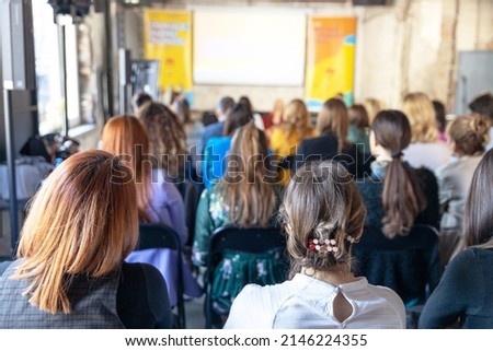 Audience at business conference or presentation 