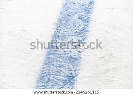 The blue line on the ice of the hockey rink - offside in hockey the entrance to the attacking zone 