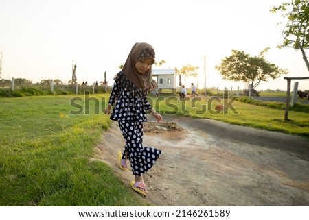 Portrait of Muslim girl in the farm